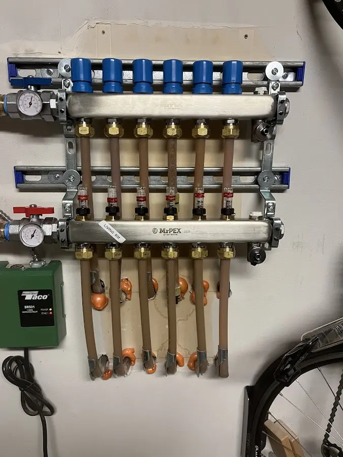 Plumber performing Gas Line Installation at a residential property in Wilder